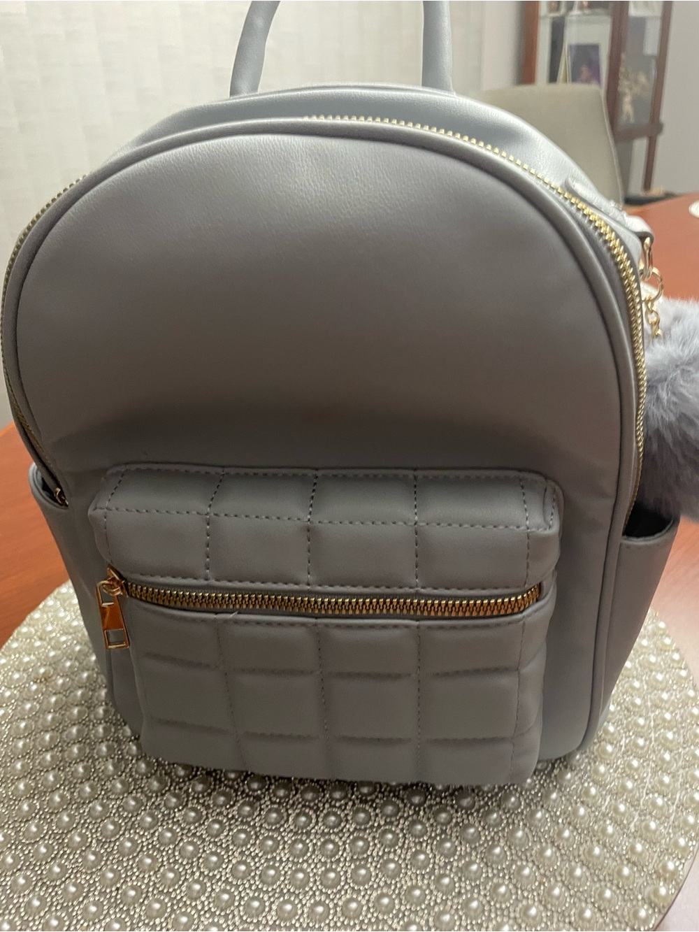 Women's Quilted Gray Mini Backpack with Gold Hardware